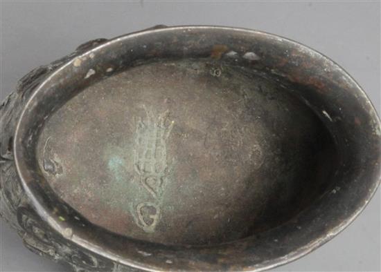 A Chinese archaic bronze ritual wine cup, Zhi, late Shang/early Western Zhou dynasty, 11th century B.C., 12.5cm, rim probably altered